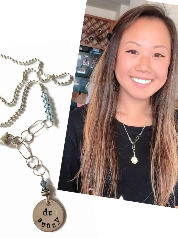 silver personalized charm necklace for job and modeled